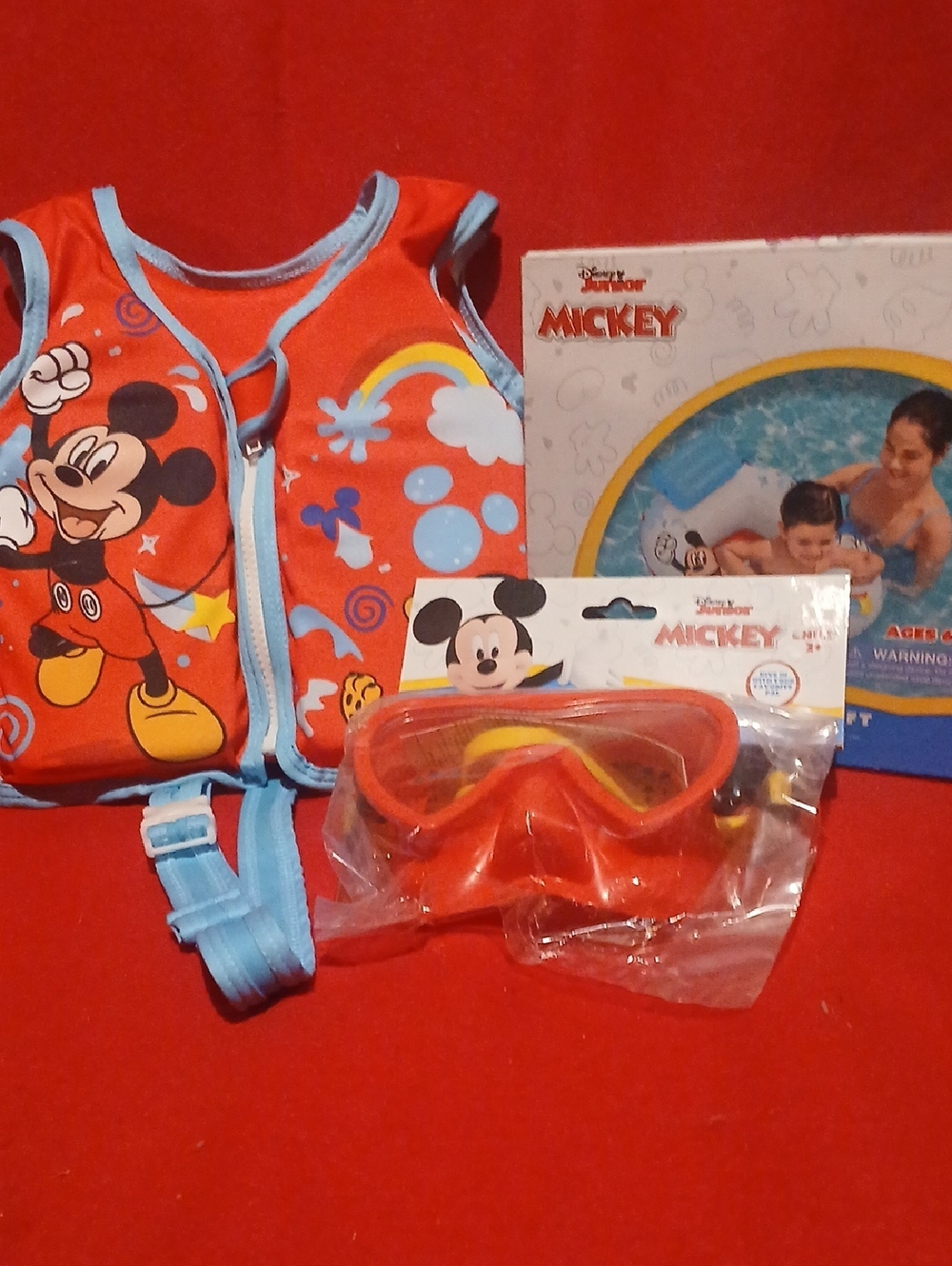 Disney Mickey Mouse Swim Vest, Red Goggles, And A Baby Watercraft
